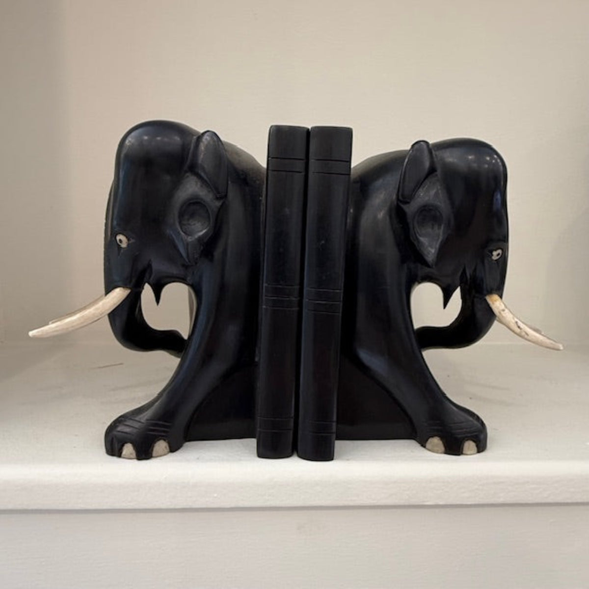 A Pair of Mid-Century Ebony Indian Elephant Bookends