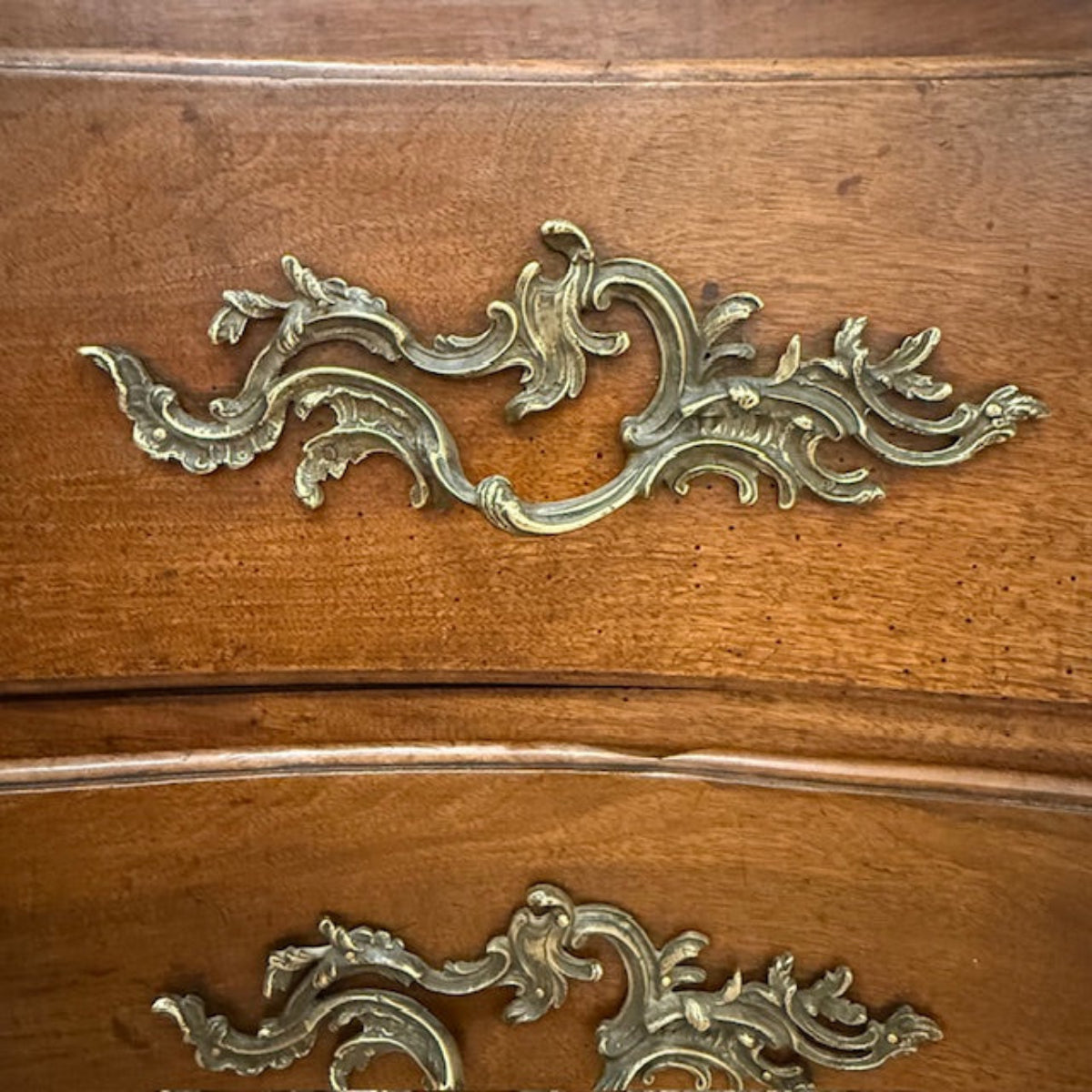 Early Provincial French Commode With Elaborate Brass Escutcheons