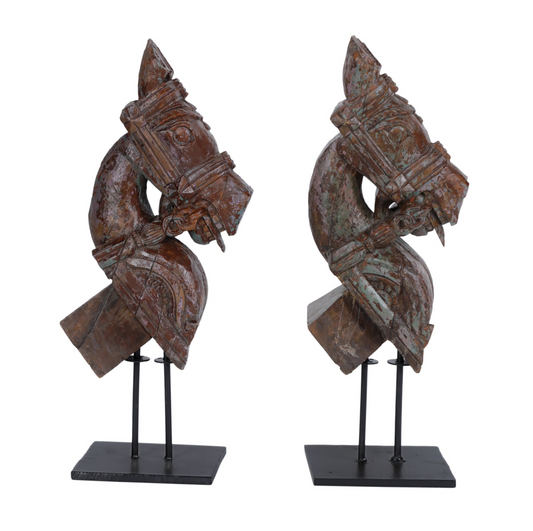 A Pair Of Antique Horse Sculptures