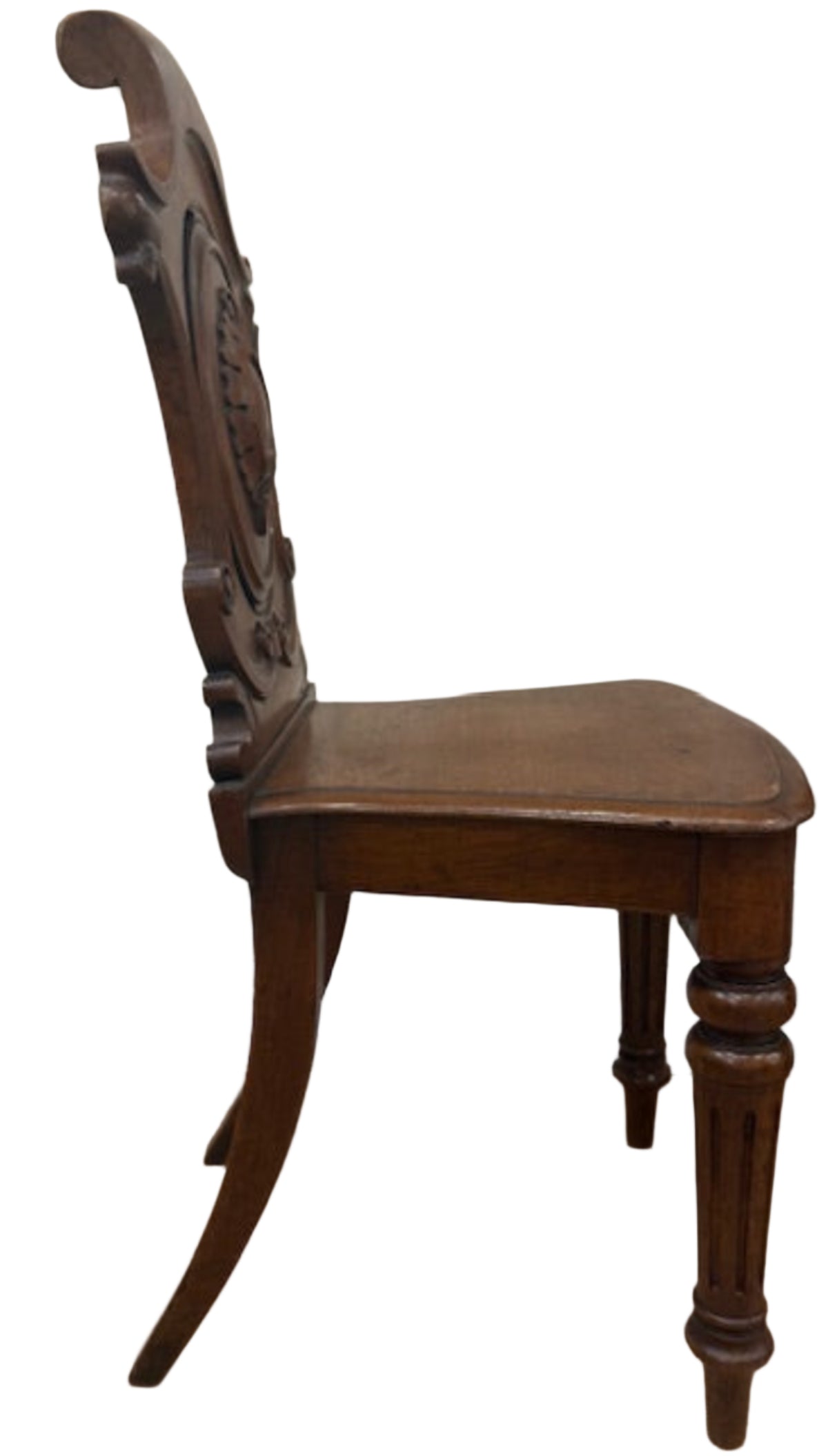 A Pair Of Carved Oak Hall Chairs