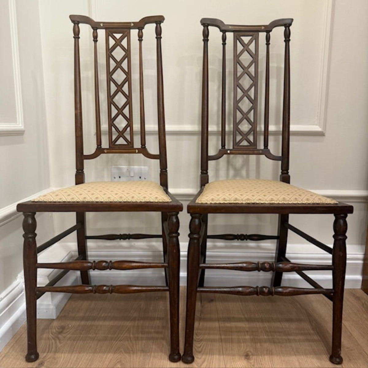 A Pair Of Edwardian Lattice Back Mahogany Chairs