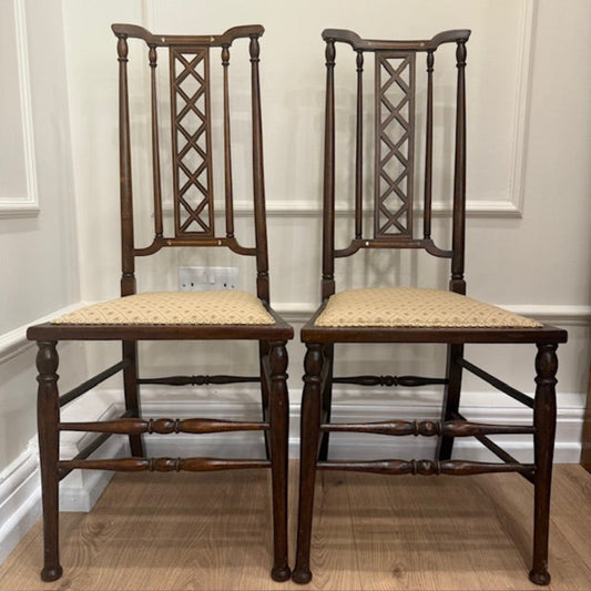 A Pair Of Edwardian Lattice Back Mahogany Chairs
