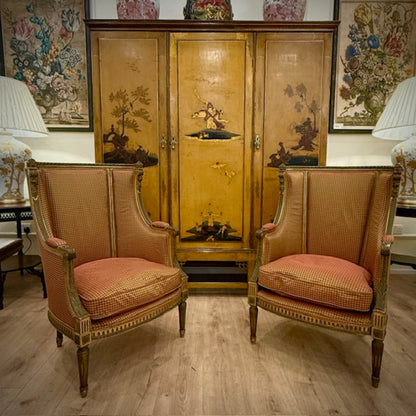 A Pair Of French Giltwood Bergère Chairs
