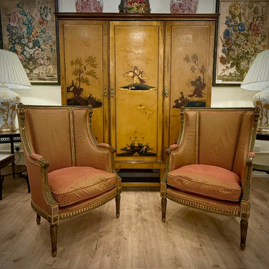 A Pair Of French Giltwood Bergère Chairs