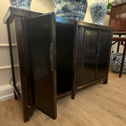 A striking Oriental Sideboard In Rich Black Lacquer